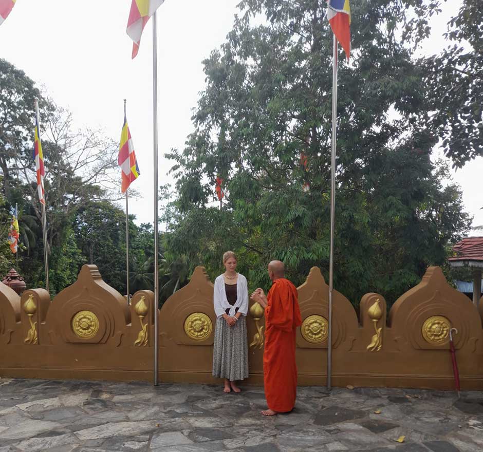 a spiritual enthusiast with sri lankan buddhist monk  