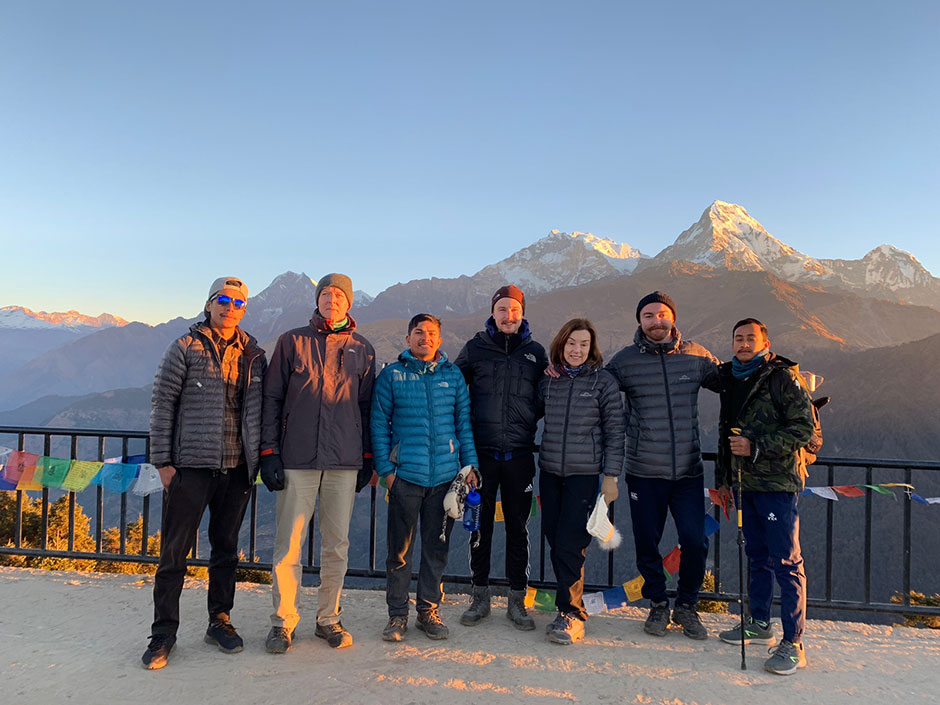 Shane with his family in front of annapurna mountain 