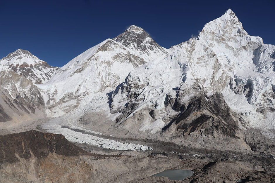 a glacier with the everest in backdrop