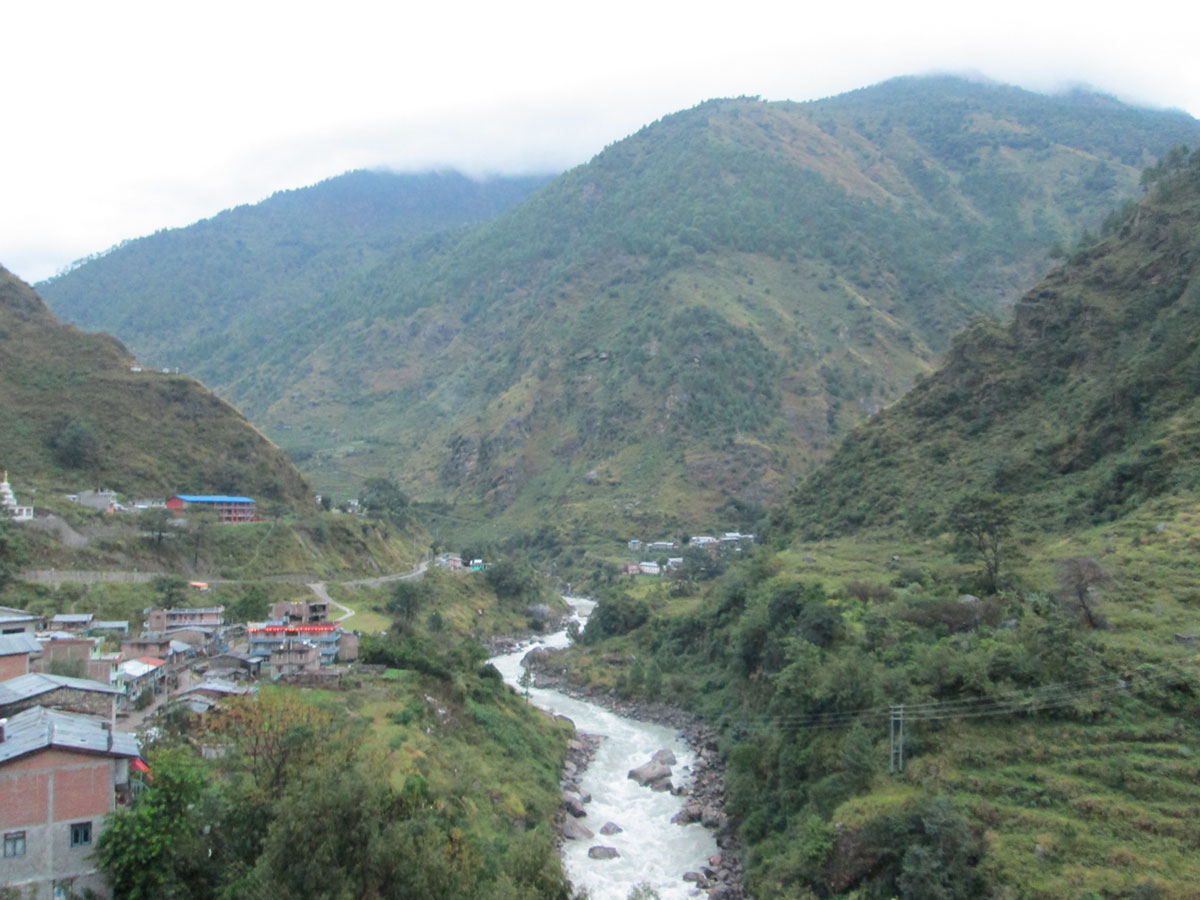 village in rasuwa by the bank of bhotekoshi before flood