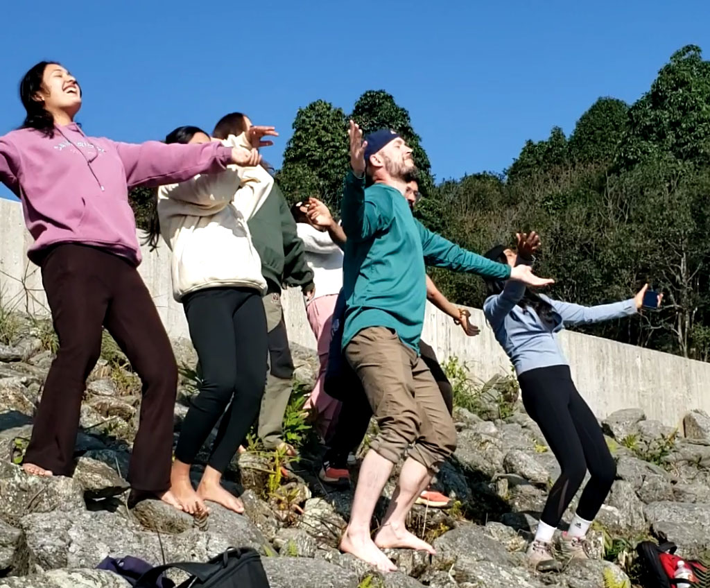 zach embracing his peaceful moment in nepal  