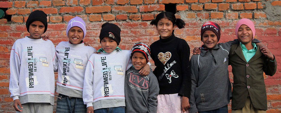 volunteer fdip distributes winter clothes to kids