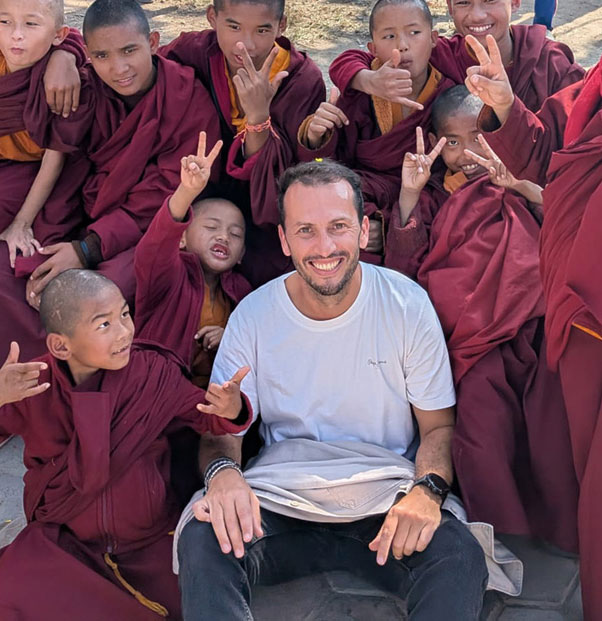 diogo with monk kids